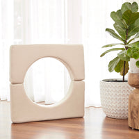 a pair of special arch shapes making a circle opening of the membina play couch