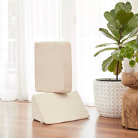 two triangle backrests leaning on top of one another