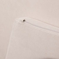 a close up shot of the zip hood that covers the zip head for safety on the membina play couch